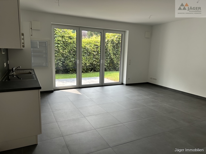 Erdgeschoss: neuwertige Wohnung mit EBK - Foto 1